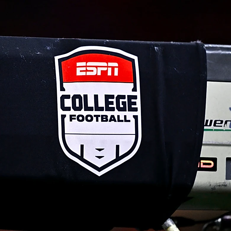 Why is ESPN removing its bottom-line ticker for college football games?