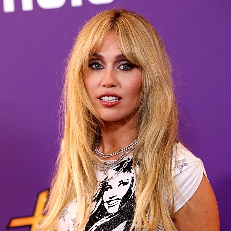 Why did Miley Cyrus drop her last name?
