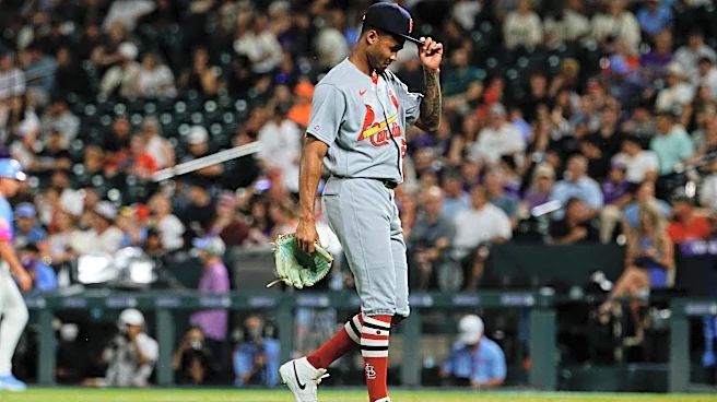 Cardinals, Rockies wore titled caps in support of rookie pitcher scolded by umpire