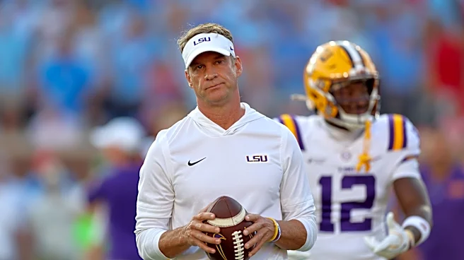 Lane Kiffin chucks football into Ole Miss crowd before LSU game