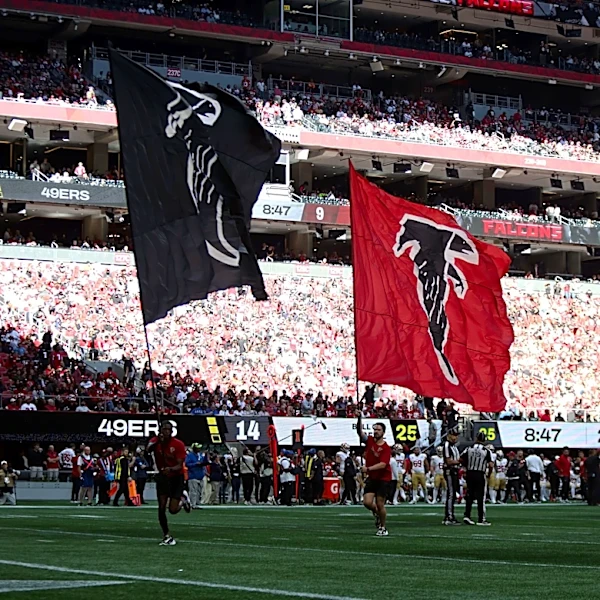The Falcons helped a microphone operator after collision instead of celebrating a TD