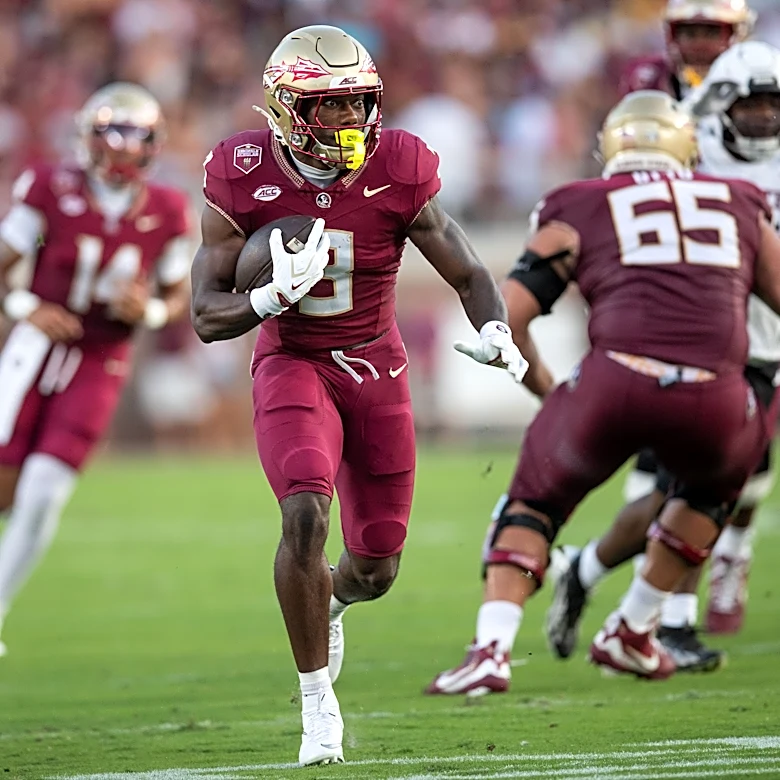 FSU's Samuel Singleton Jr. breaks the rock after New Mexico State win