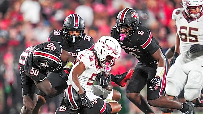 Is FSU ranked in the AP Top 25 after losing to Louisville?