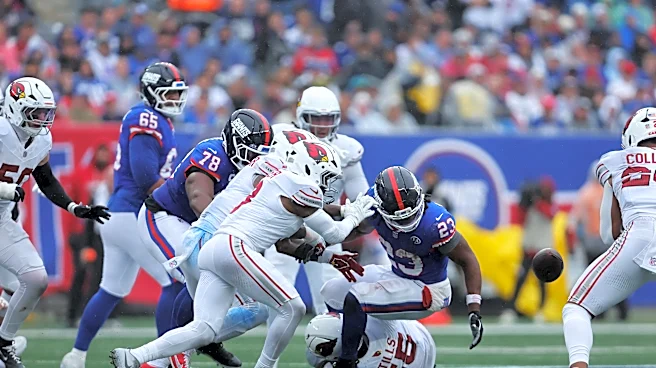 John Harbaugh says New York Giants' backs must clean up fumbling issues