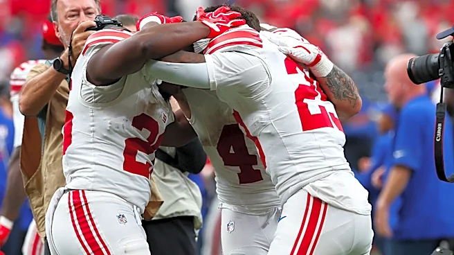 See it: Giants running backs embrace, tackle John Harbaugh after Week 7 win