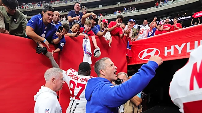 John Harbaugh: Giants 'in this thing until the end' after Houston win