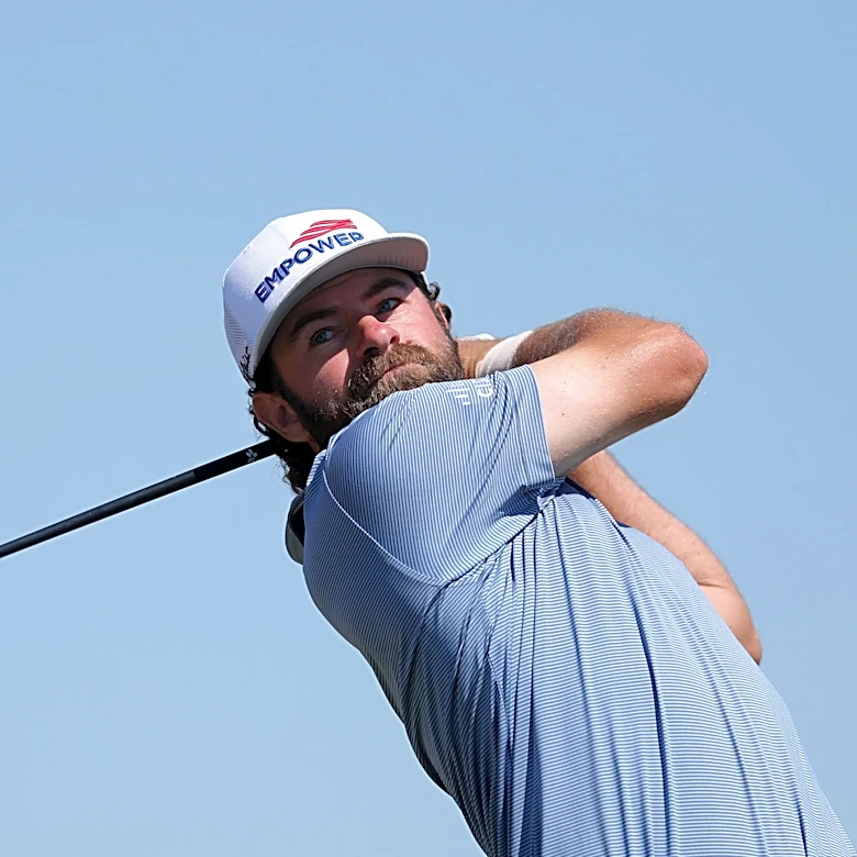 Is Cameron Young's swing pause a flaw or a secret to his success?
