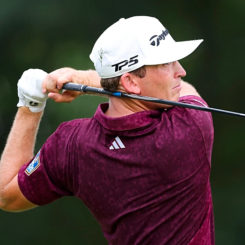 Slice? Jacob Bridgeman hits tee shot into a pizza stand at Tour Championship