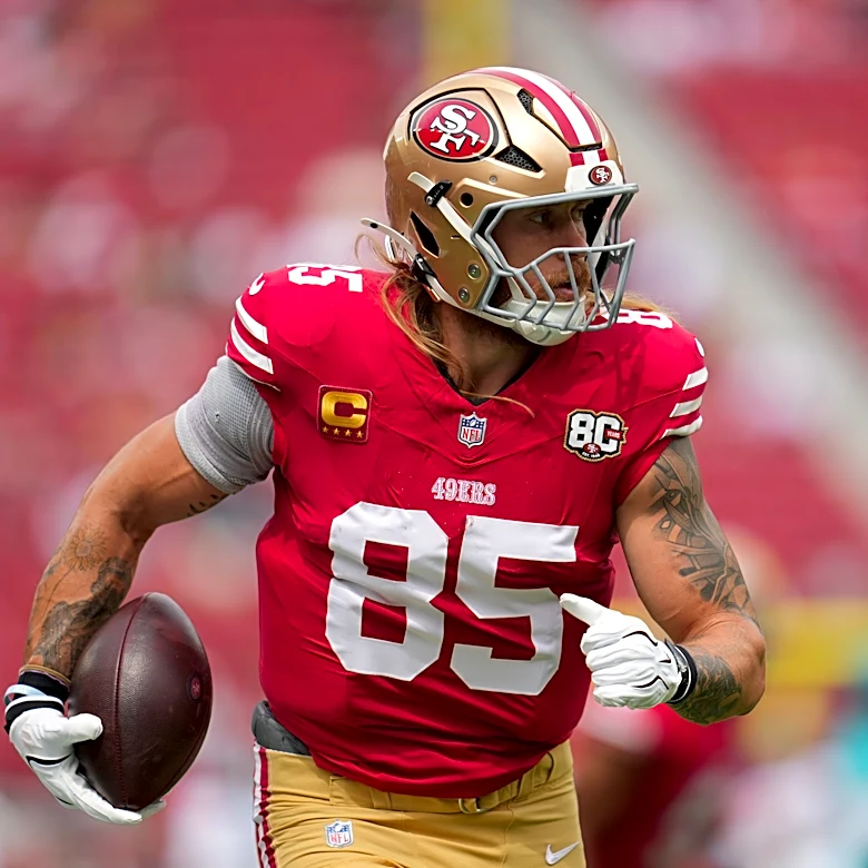Rich Eisen pays off Iowa-Michigan bet with 49ers' George Kittle