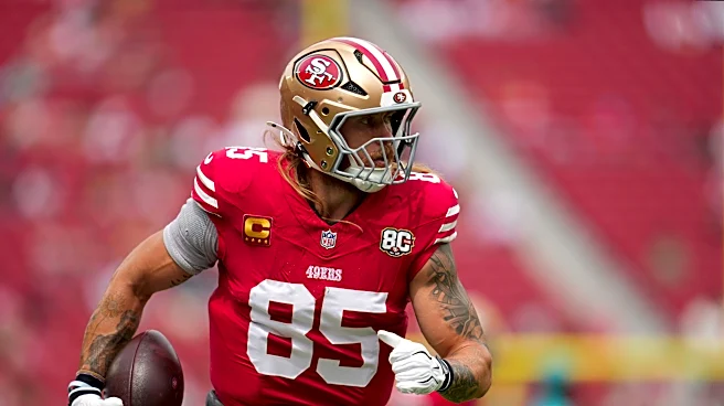 Rich Eisen pays off Iowa-Michigan bet with 49ers' George Kittle