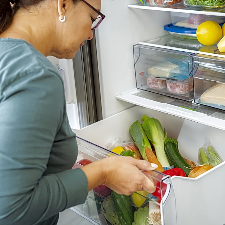 Use Old Dish Towels To Create Budget-Friendly Fridge Liners