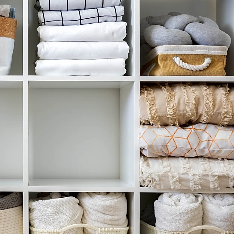 Stop Overstuffing Linen Closets: The Better Way To Organize Blankets