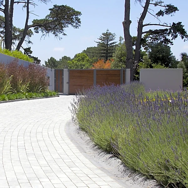 Not Brick, Not Pavers: The Driveway Edging Idea To Add Extra Foliage To Your Front Yard