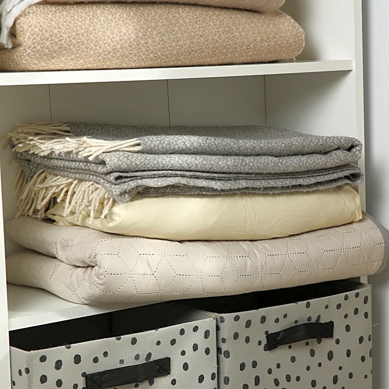 Not Bins Or Baskets: The Bedroom DIY That Can Hide Your Blanket Storage