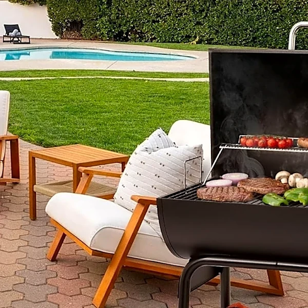 Amazon's Charcoal Grill Has Extra Storage Space And Room For Up To 25 Burgers