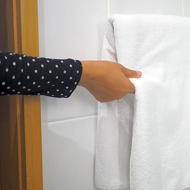 Say Bye To Boring Towel Racks — This Retro 80s Find Is A Cuter Way To Hang & Store Towels