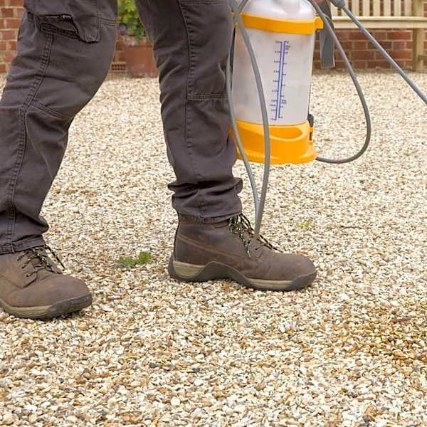 Ditch The Chemicals: This Tool Combo Is A No-Dig Way To Remove Weeds From Gravel Driveways