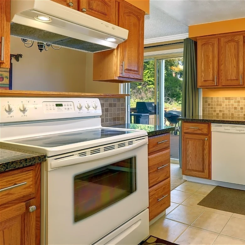 Not Paint, Not Stain: The More Stylish Way To Update Golden Oak Cabinets