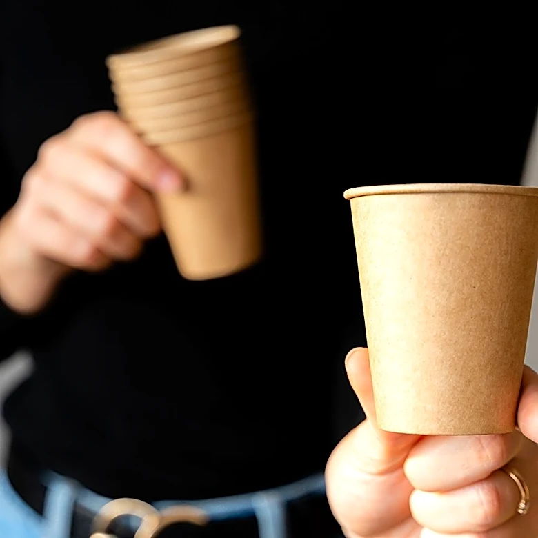 Easily Turn Paper Cups, A Baking Tray, And Cement Into A Beautiful Plant Stand