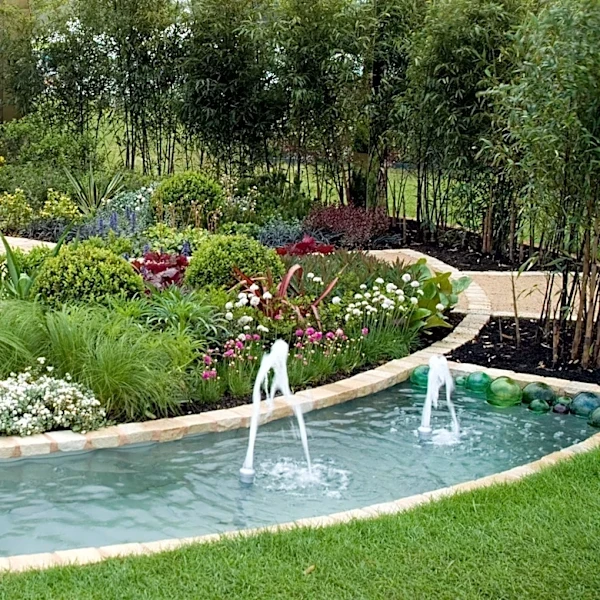 If You Want Your Backyard To Look Like An Oasis, Then Try This Landscaping Style