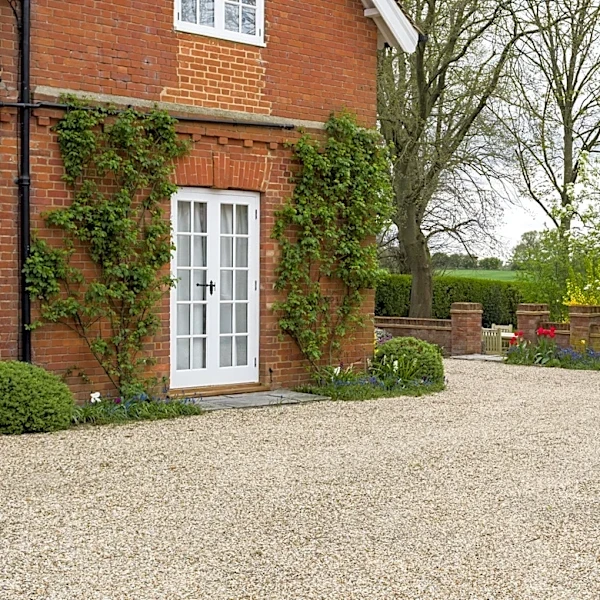 Skip Traditional Landscape Fabric: Here's A Durable Option For Gravel Driveways