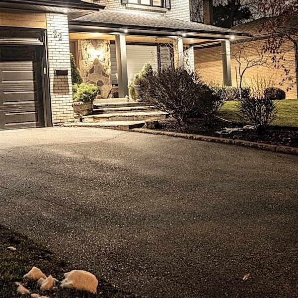 Not Stakes, Not Lanterns: The Creative Way To Light Up A Simple Concrete Driveway