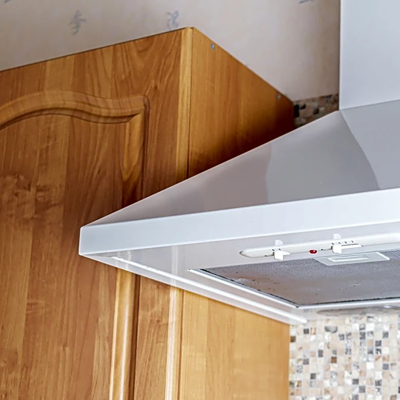 Ditch Traditional Range Hoods: Try This Old-World DIY To Add Storage To Your Kitchen