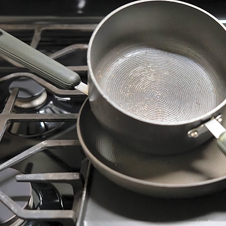 Not A Planter Nor Decor: Give Your Old Frying Pan A Functional New Life On The Living Room Wall