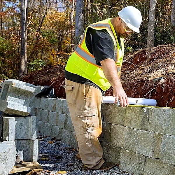 Ditch Concrete Blocks: How To Build A Retaining Wall From Rammed Earth