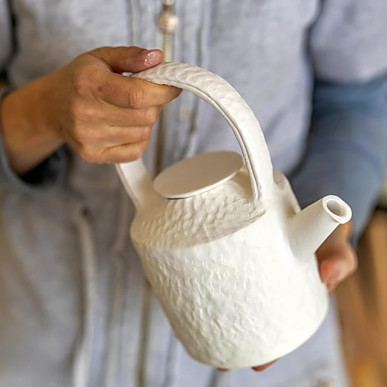 Repurpose A Teapot Into A Unique Utensil Holder For Your Kitchen