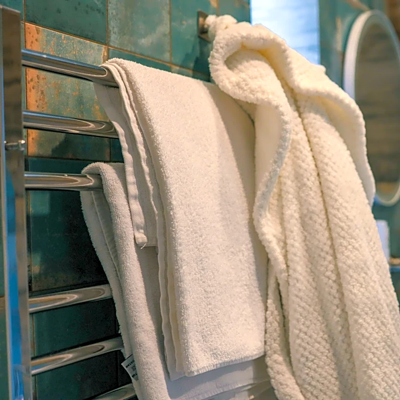 Skip The Towel Rack And Use This Amazon Find That Doubles As Toilet Paper Storage