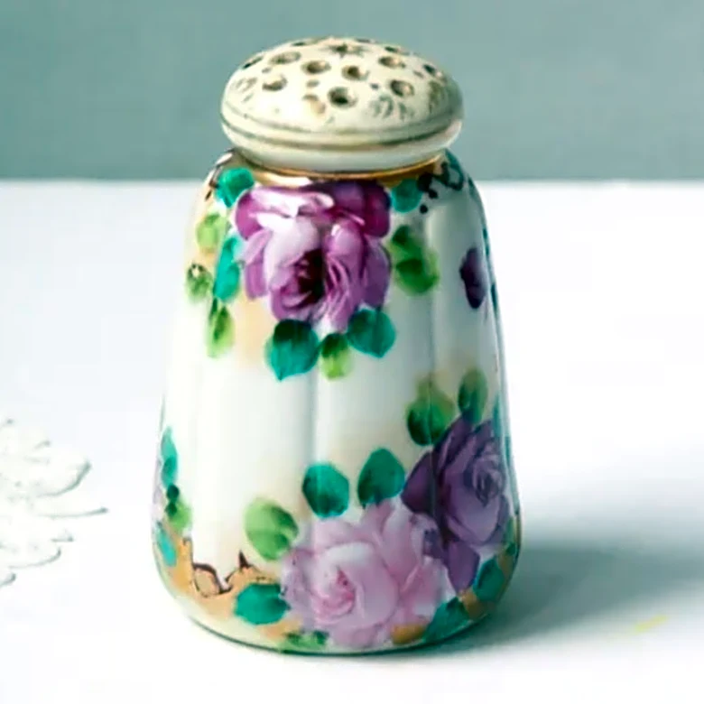 Not As Table Decor: Reuse A Thrifted Sugar Shaker To Keep Items Neat & Organized