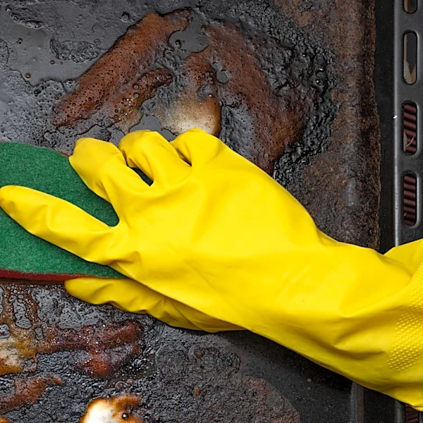 The Popular Cleaning Product That'll Bring Your Old Baking Sheets Back To Life