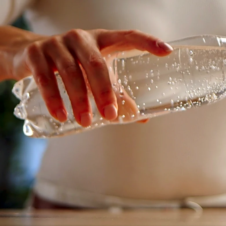 Use A Plastic Bottle To Make A Mobile That Catches The Sun