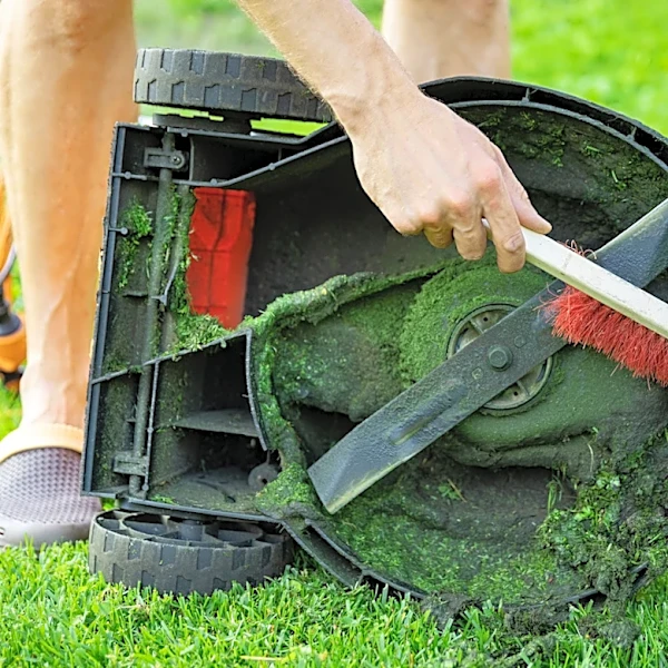 How To Prevent Grass From Sticking To Your Lawn Mower Blades (It's Not WD-40)