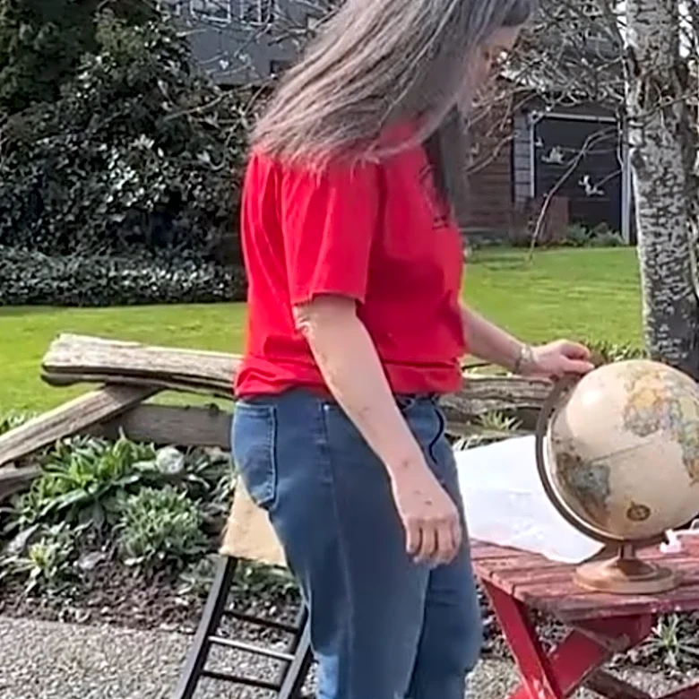Transform An Old Globe Into A Creative Way To Add Paper Towel Storage To Your Kitchen