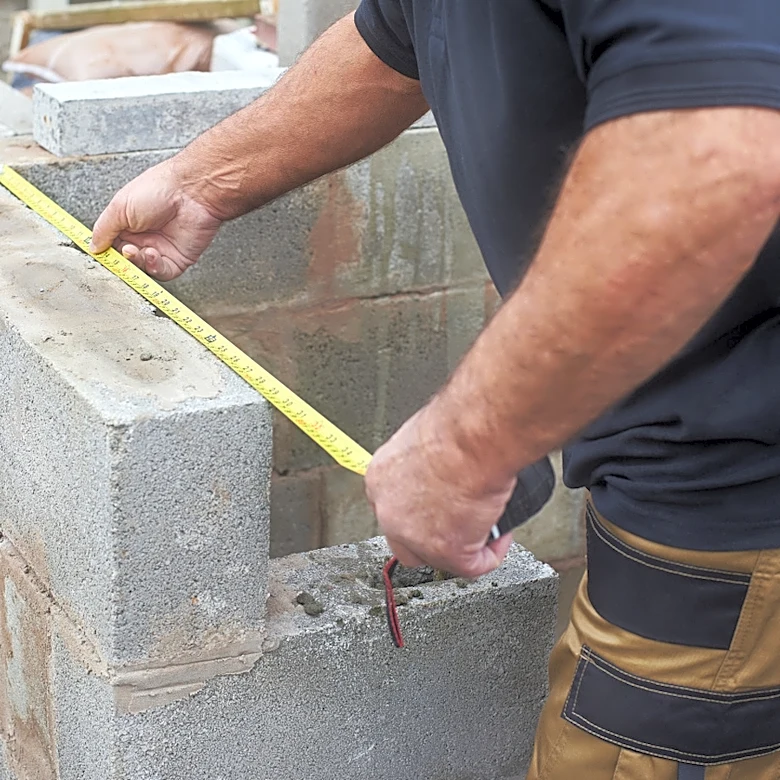 Man Transforms Cinder Blocks & Bricks Into An Outdoor Kitchen Space With An Impressive DIY