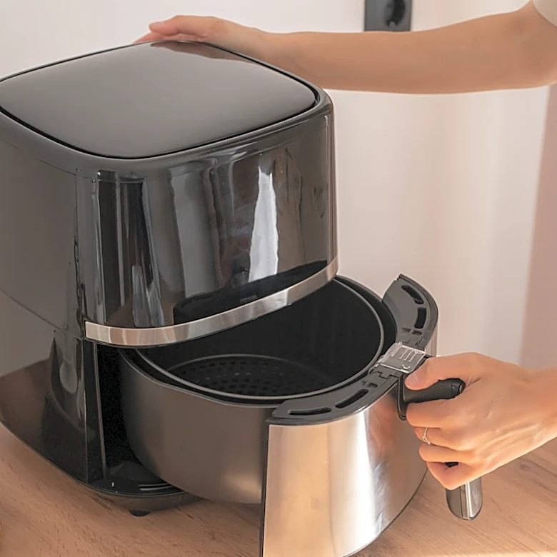 Combine These Two Kitchen Staples To Easily Clean Your Air Fryer