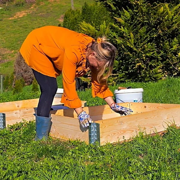 Using Recycled Wood For DIY Raised Garden Beds Is A Good Idea — Unless It's This Type
