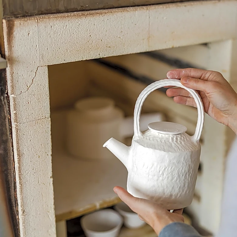 Use Old Teapots For A Creative Way To Make A Bird Bath