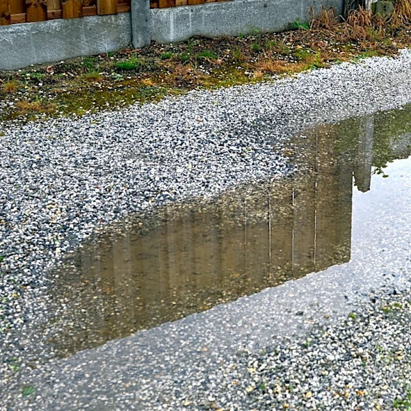The Real Reason Gravel Driveways Can Sink Into The Soil, And It's Not Just Wear Or Drainage