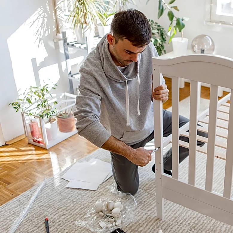 Man Turns Old Wood Crib Into A Stylish Swinging Patio Bench With An Impressive DIY