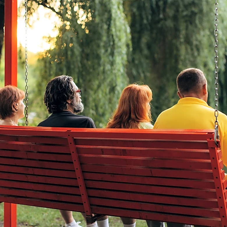 Man Turns Old Wood Pallets Into A Cheaper DIY Rustic Patio Swing