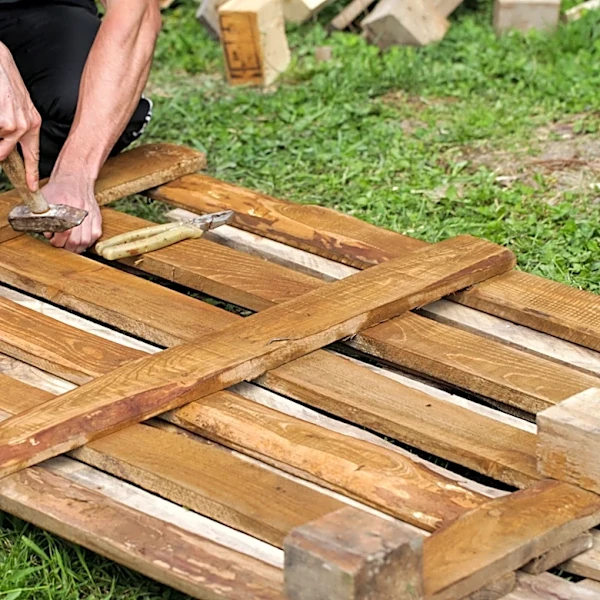 Don't Toss Old Pallets — Reuse Them To Make An Incredibly Easy-To-Build Herb Garden