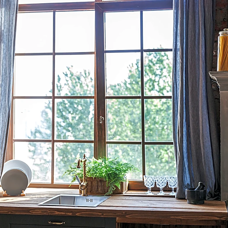 Forget Traditional Kitchen Window Treatments: The Rustic Alternative That Brings A Cozy Vibe