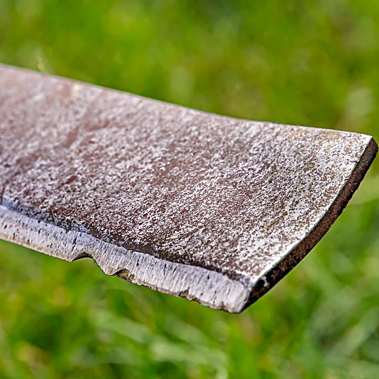 Stop Tossing Old Lawn Mower Blades: Turn Them Into A Helpful Garden Tool