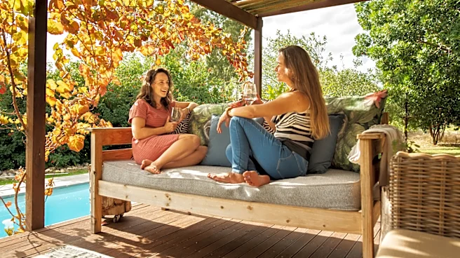 This Walmart Wooden Outdoor Storage Find Doubles As Extra Patio Seating