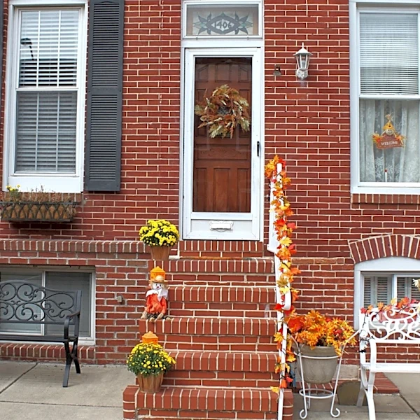 Forget The Porch Garland: Bring Back Nostalgic '90s Halloween With These Pumpkin Tree Lanterns