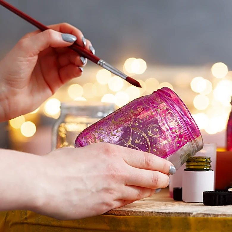Use Clay, Paint, And Glue To Transform A Pickle Jar Into The Cutest Fairy House