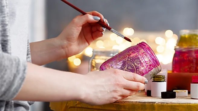 Use Clay, Paint, And Glue To Transform A Pickle Jar Into The Cutest Fairy House
